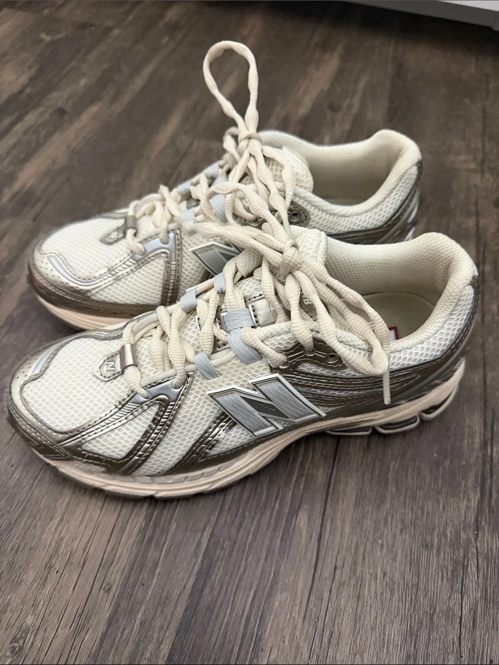 New Balance Women’s Cream and Metallic Silver Athletic Sneakers 1906